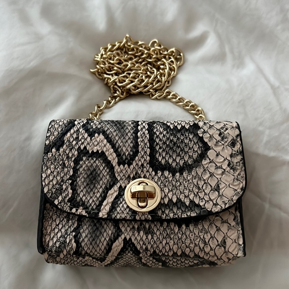 Nude snakeskin mini bag on chain